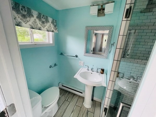 102 Harrow Road Springfield, MA 01118 - Photo 17 of 35 a bathroom with a sink toilet and a mirror