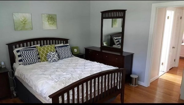 102 Harrow Road Springfield, MA 01118 - Photo 18 of 35 a bedroom with a bed and a dresser