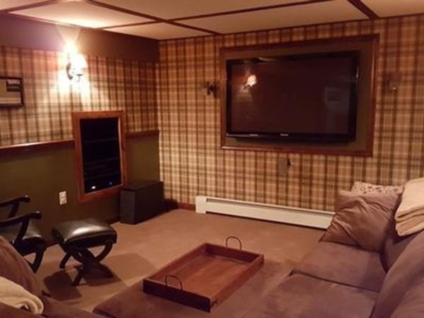 102 Harrow Road Springfield, MA 01118 - Photo 26 of 35 a living room with a couch and a flat screen tv