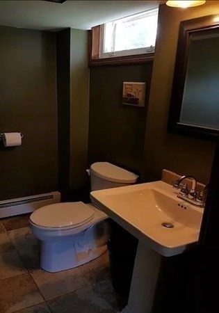102 Harrow Road Springfield, MA 01118 - Photo 32 of 35 a bathroom with a sink toilet and mirror