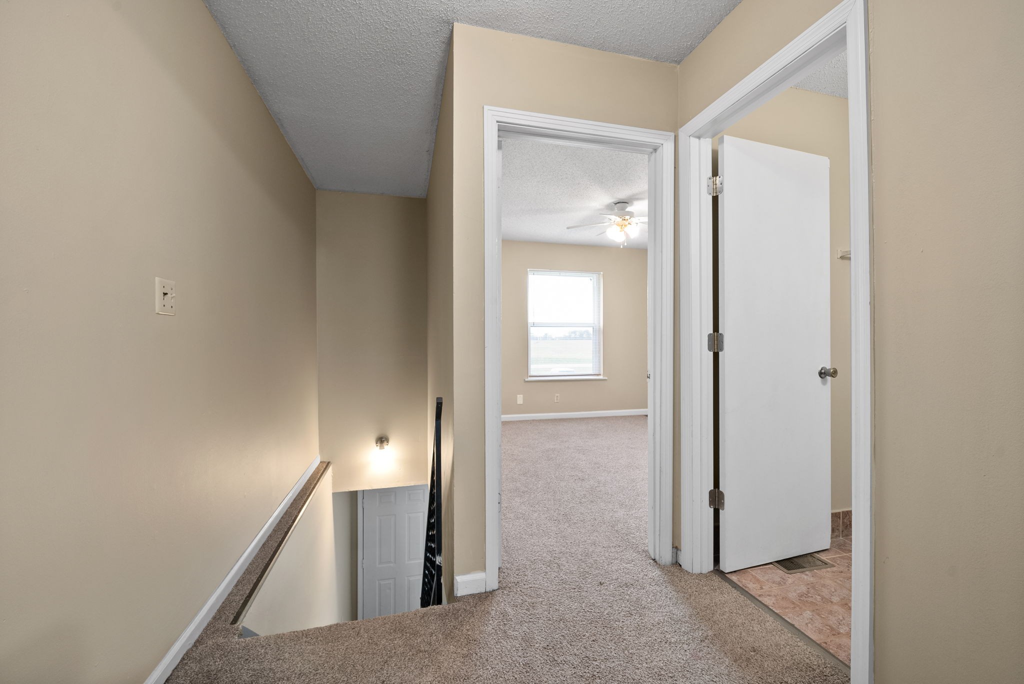 1044 Pembroke Oak Grove Road Oak Grove, KY 42262 - Photo 14 of 40 a view of a room that has a large window and wooden floor