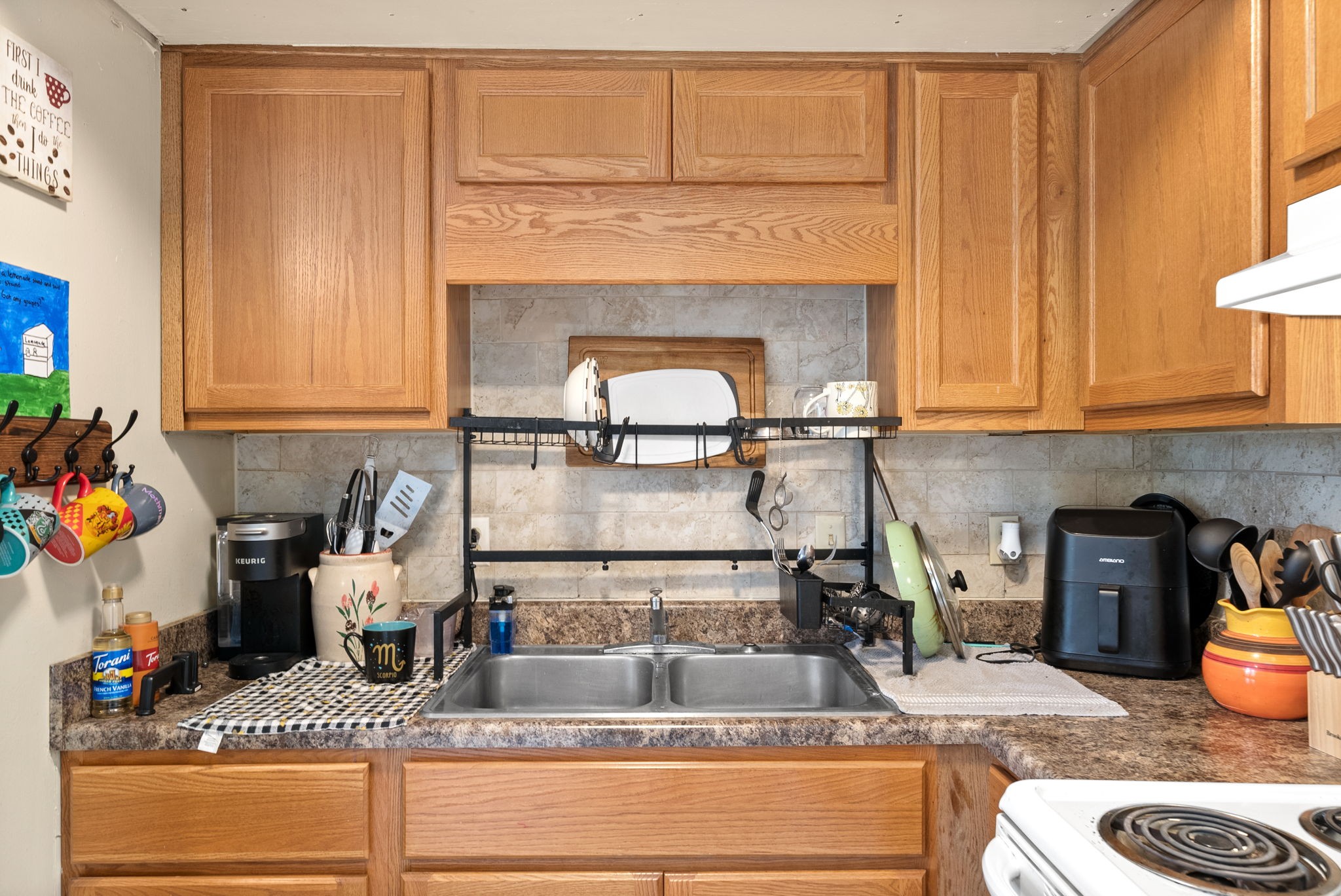 1044 Pembroke Oak Grove Road Oak Grove, KY 42262 - Photo 22 of 40 a kitchen with a sink and a stove
