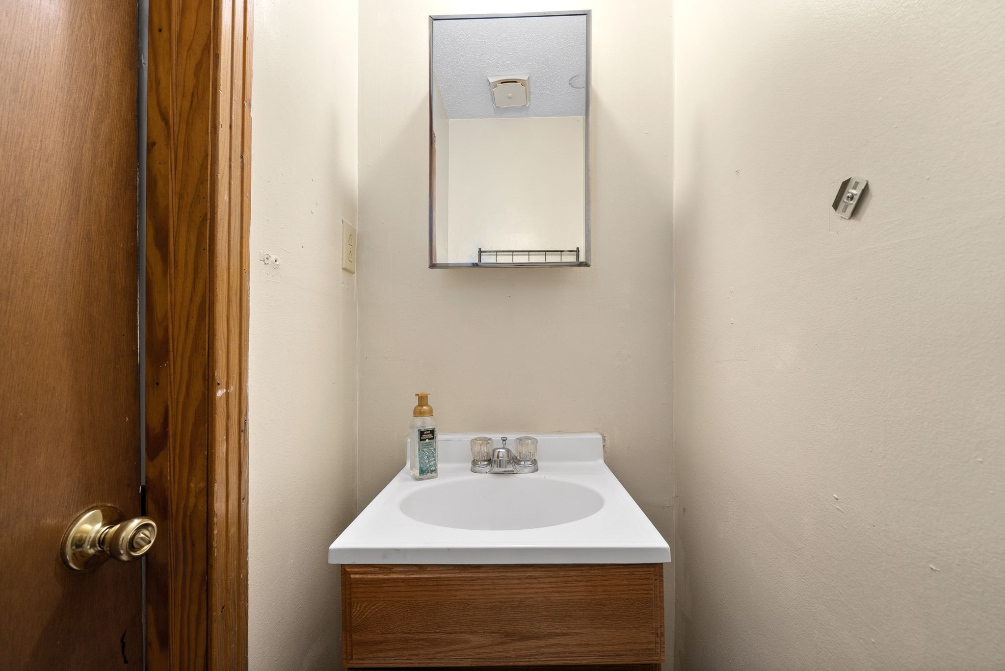 1044 Pembroke Oak Grove Road Oak Grove, KY 42262 - Photo 24 of 40 a bathroom with a sink and a mirror
