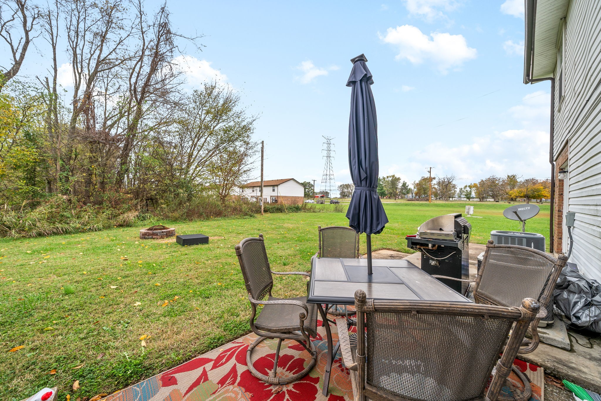 1044 Pembroke Oak Grove Road Oak Grove, KY 42262 - Photo 32 of 40 a view of a table and chairs in the garden