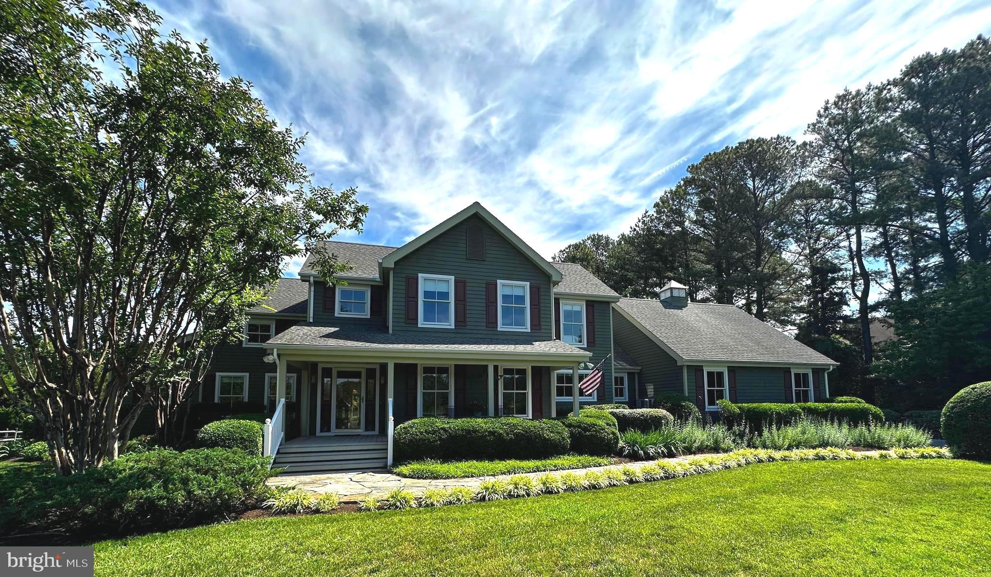 26226 Langs Landing Road Oxford, MD 21654 - Photo 1 of 48 a front view of house with yard and green space