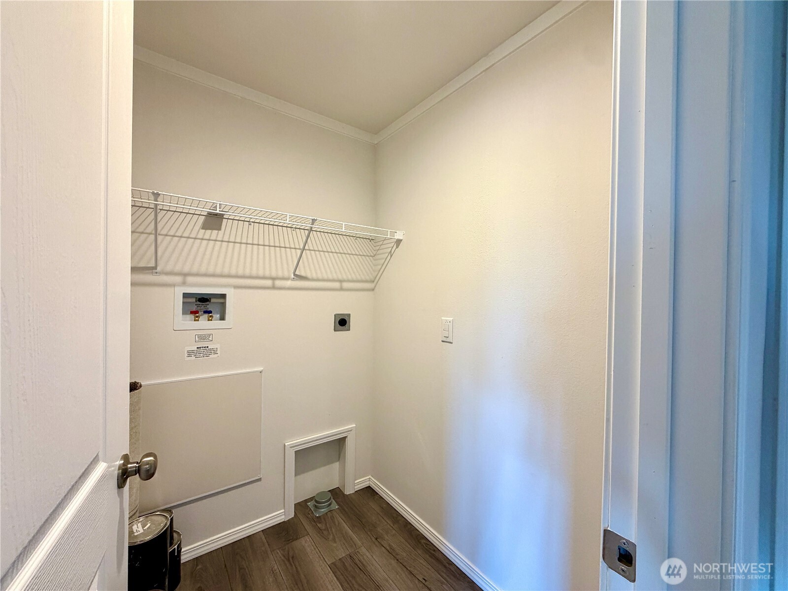 299 Octopus Avenue Northeast Ocean Shores, WA 98569 - Photo 12 of 40 a bathroom with a sink and wooden floor