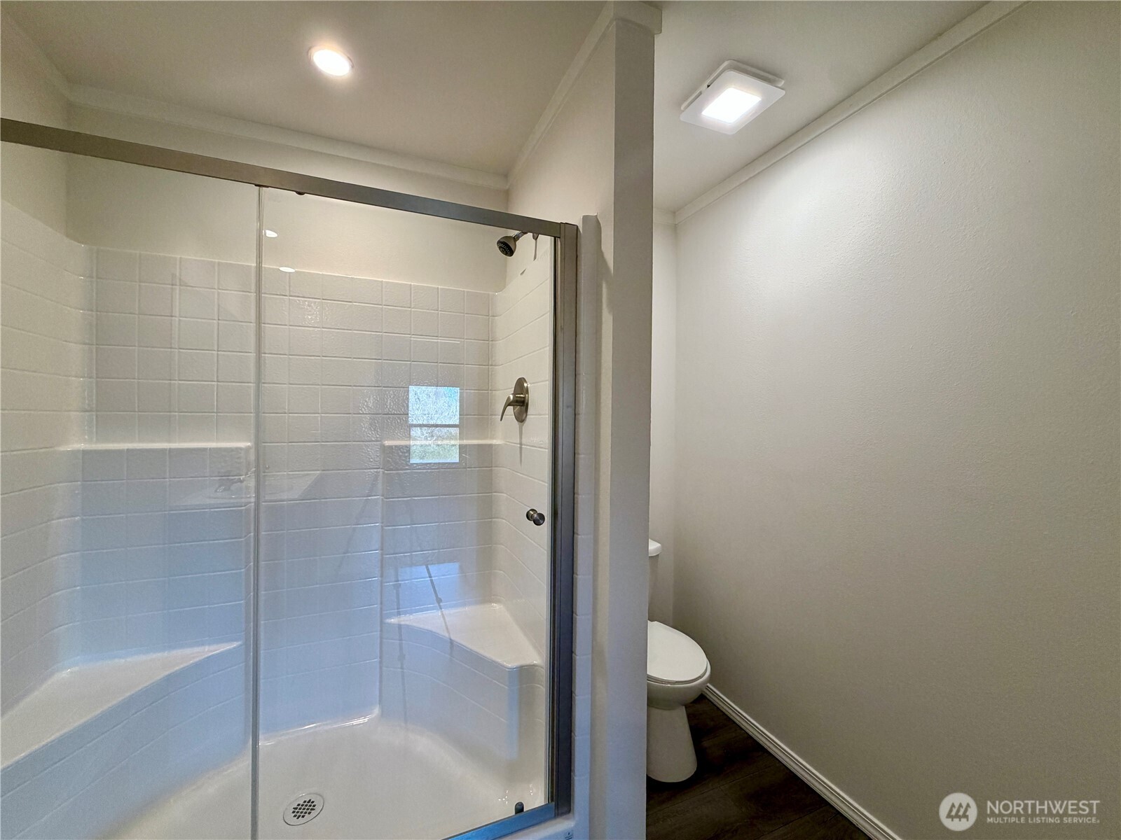 299 Octopus Avenue Northeast Ocean Shores, WA 98569 - Photo 18 of 40 a bathroom with a shower and a toilet