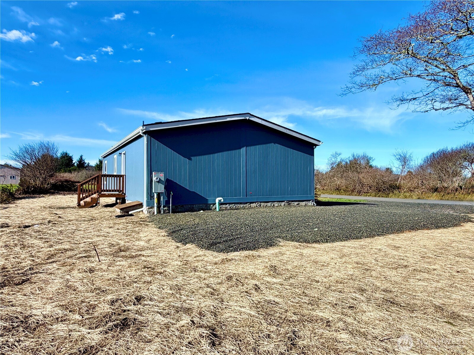 299 Octopus Avenue Northeast Ocean Shores, WA 98569 - Photo 30 of 40 a house view with a outdoor space
