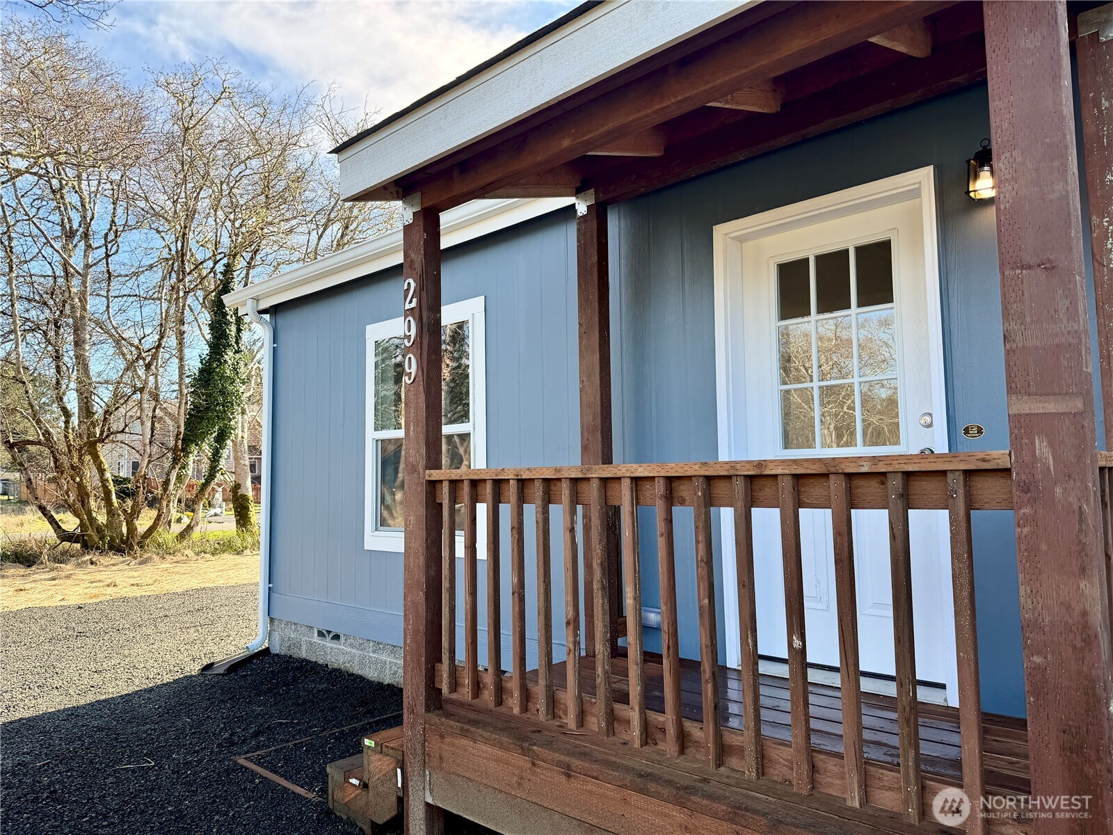 299 Octopus Avenue Northeast Ocean Shores, WA 98569 - Photo 3 of 40 a view of a house with a yard