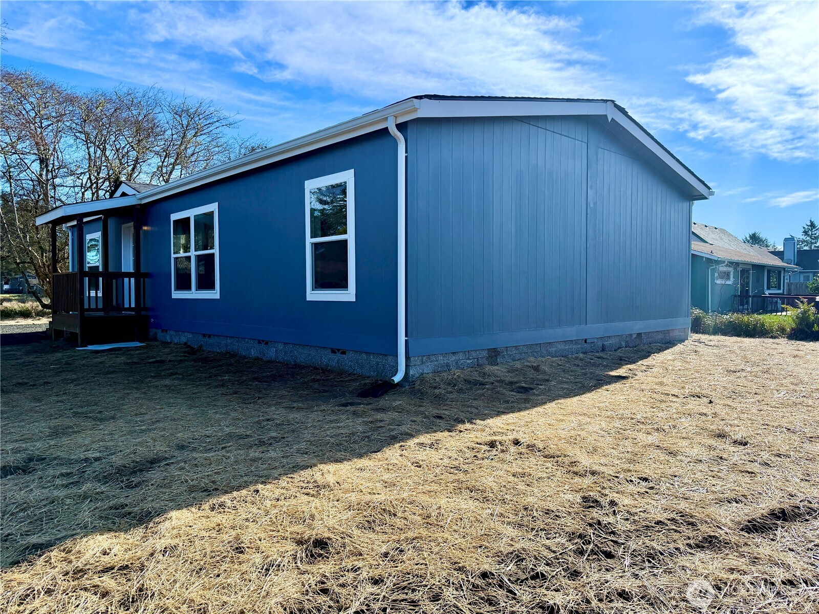 299 Octopus Avenue Northeast Ocean Shores, WA 98569 - Photo 34 of 40 a view of a house with a yard