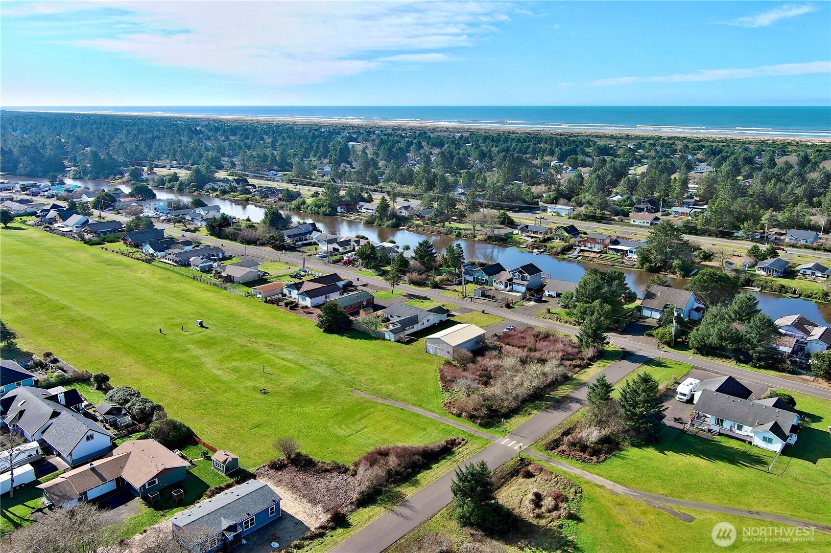 299 Octopus Avenue Northeast Ocean Shores, WA 98569 - Photo 35 of 40 an aerial view of multiple house