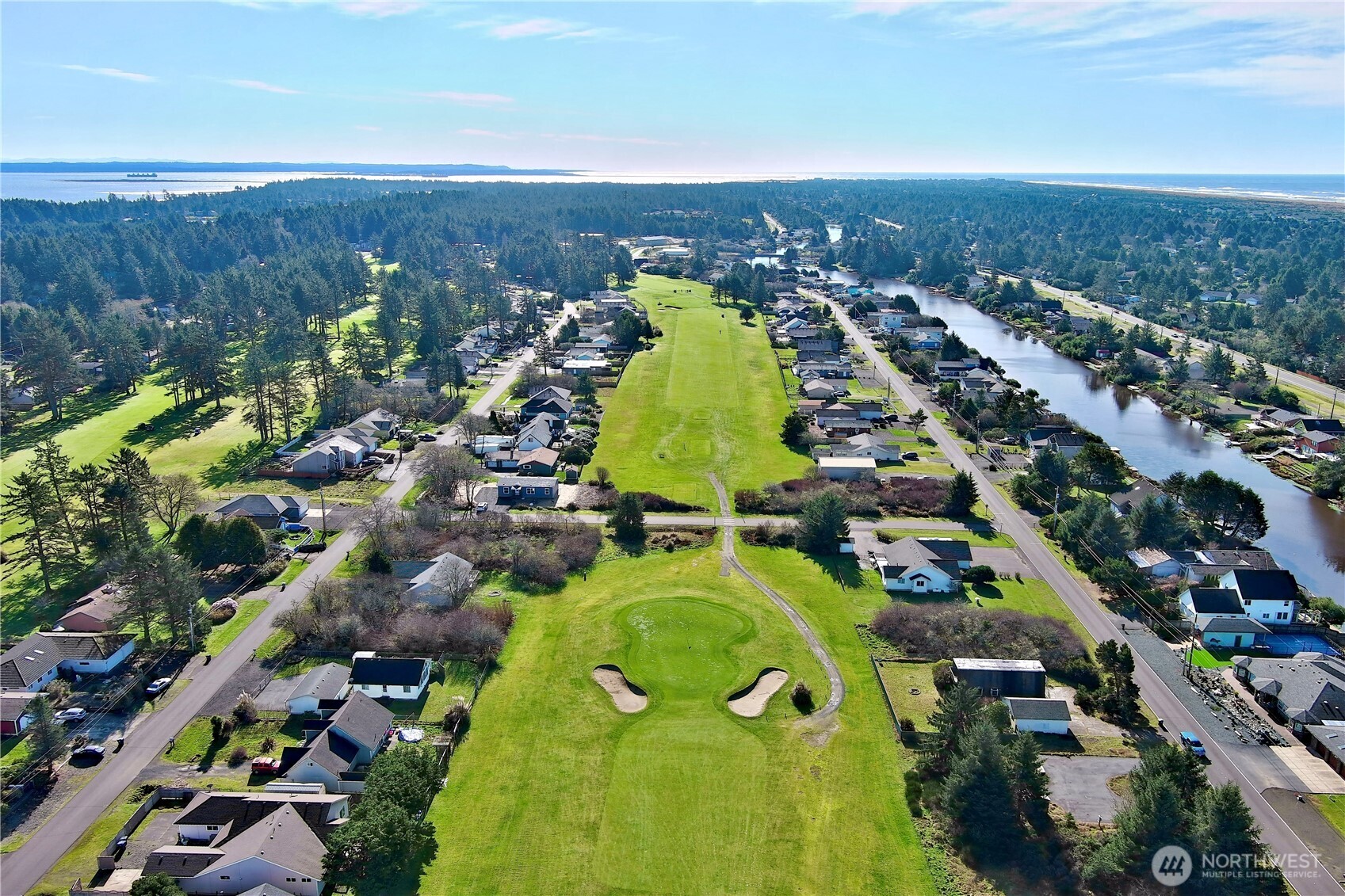 299 Octopus Avenue Northeast Ocean Shores, WA 98569 - Photo 39 of 40 an aerial view of multiple house