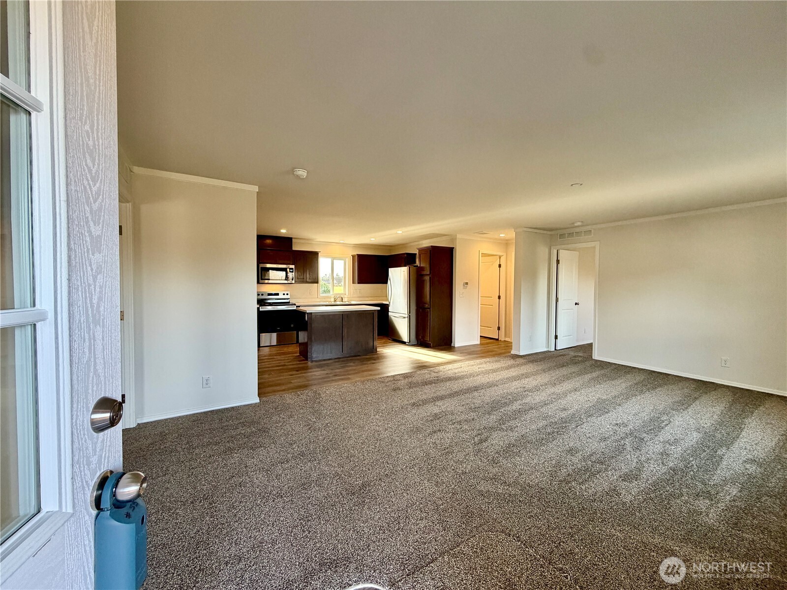 299 Octopus Avenue Northeast Ocean Shores, WA 98569 - Photo 5 of 40 a view of empty room with kitchen