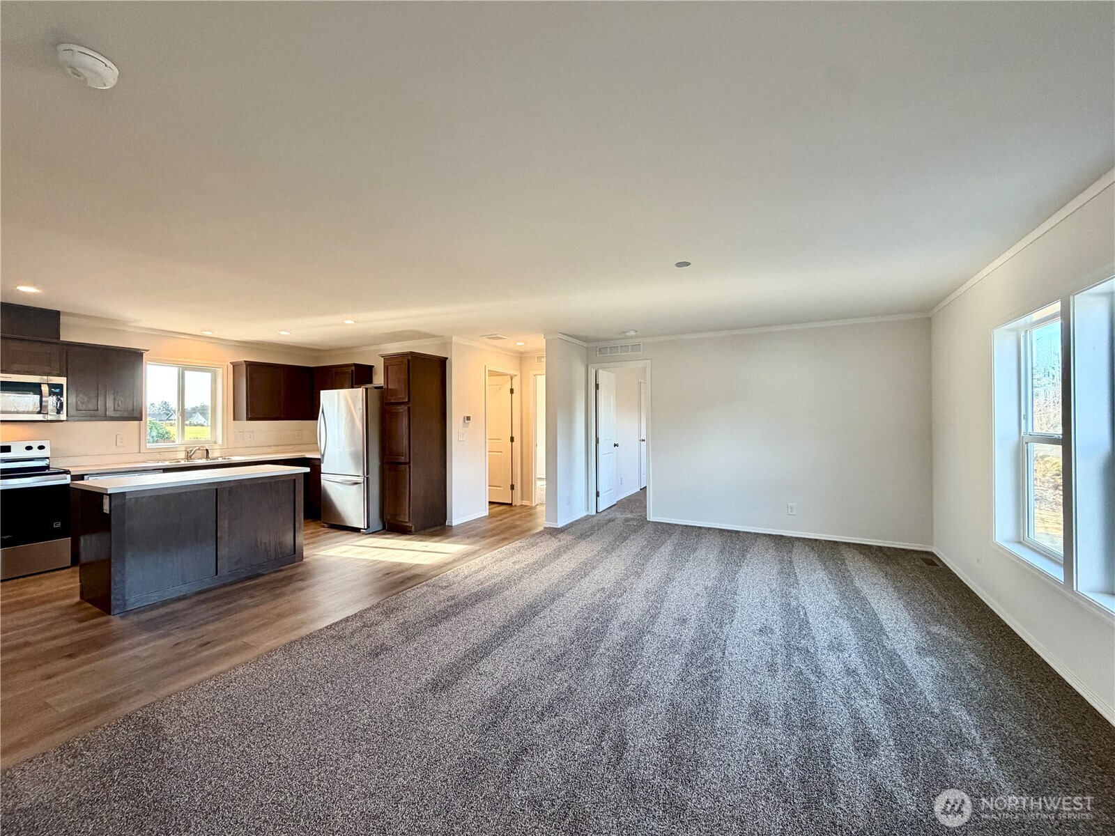 299 Octopus Avenue Northeast Ocean Shores, WA 98569 - Photo 6 of 40 a view of a kitchen with furniture and a window