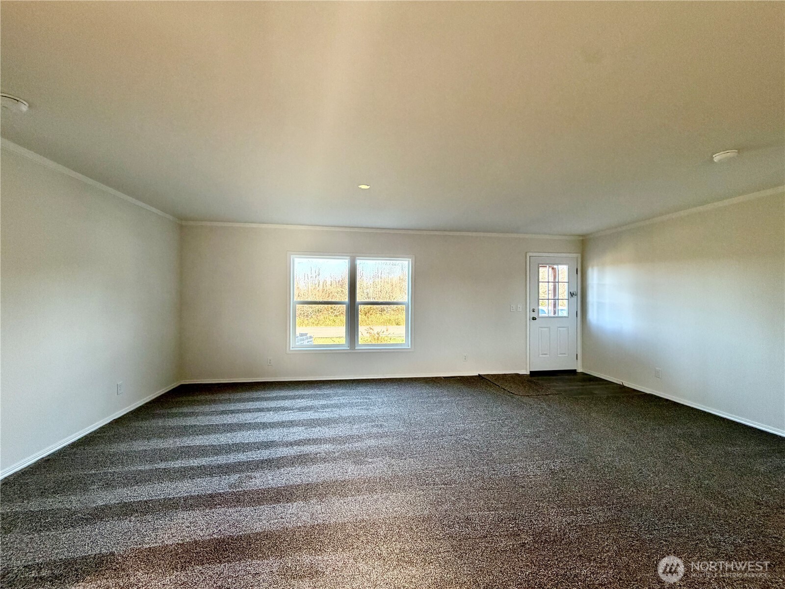 299 Octopus Avenue Northeast Ocean Shores, WA 98569 - Photo 10 of 40 an empty room with window