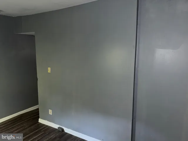 a view of room with window and stairs