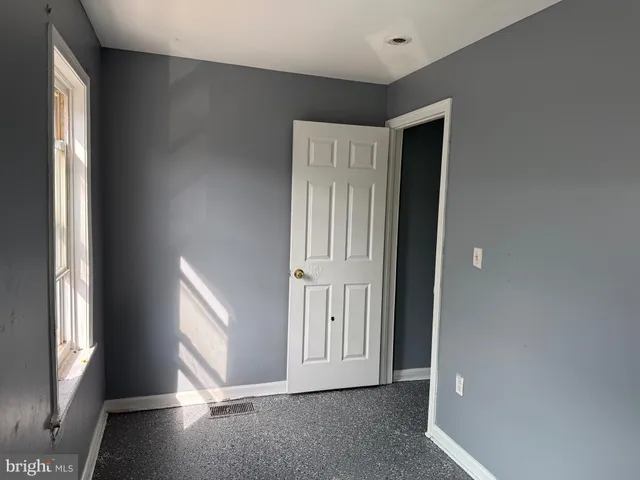 a bathroom with a sink a toilet and a shower