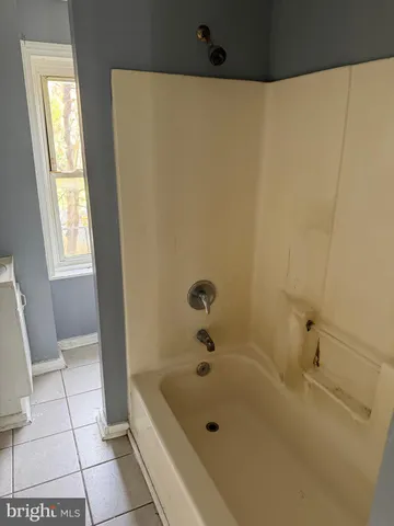 a utility room with a sink a washer and dryer