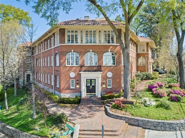 a front view of a multi story residential apartment buildings