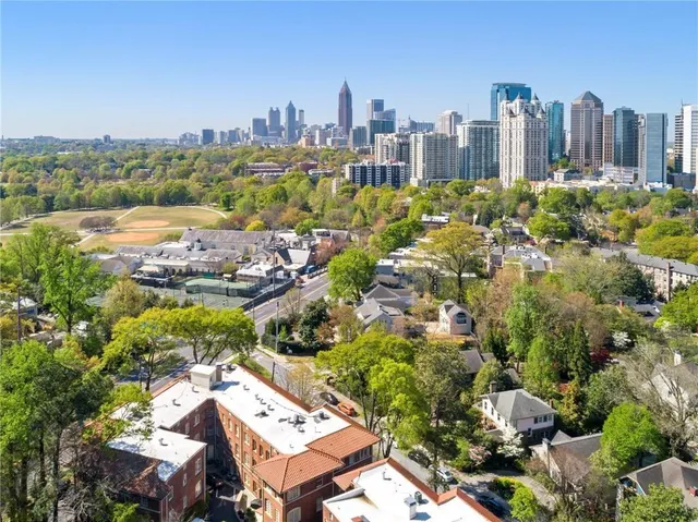 a view of a city with tall buildings