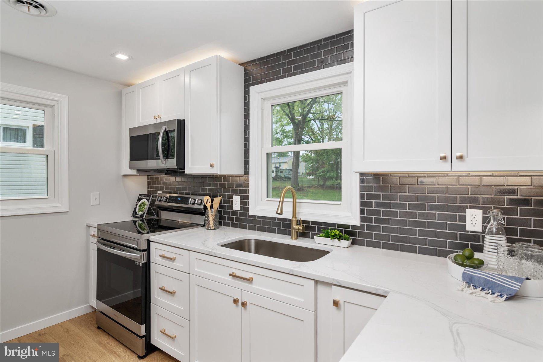 1402 Evergreen Road Severn, MD 21144 - Photo 9 of 35 Quartz Counter Tops!