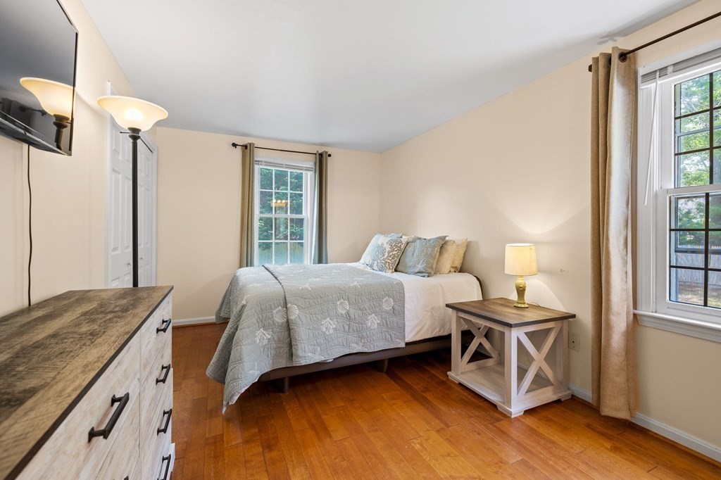 225 Skunknet Road Barnstable, MA 02632 - Photo 13 of 27 a bedroom with a bed and a window