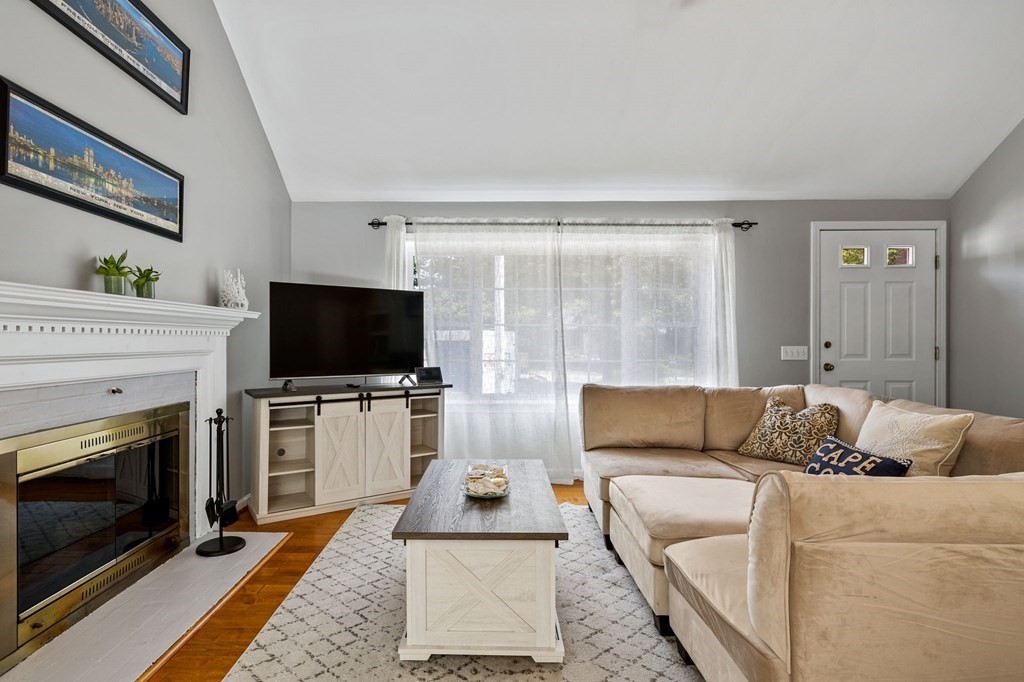 225 Skunknet Road Barnstable, MA 02632 - Photo 5 of 27 a living room with furniture and a flat screen tv