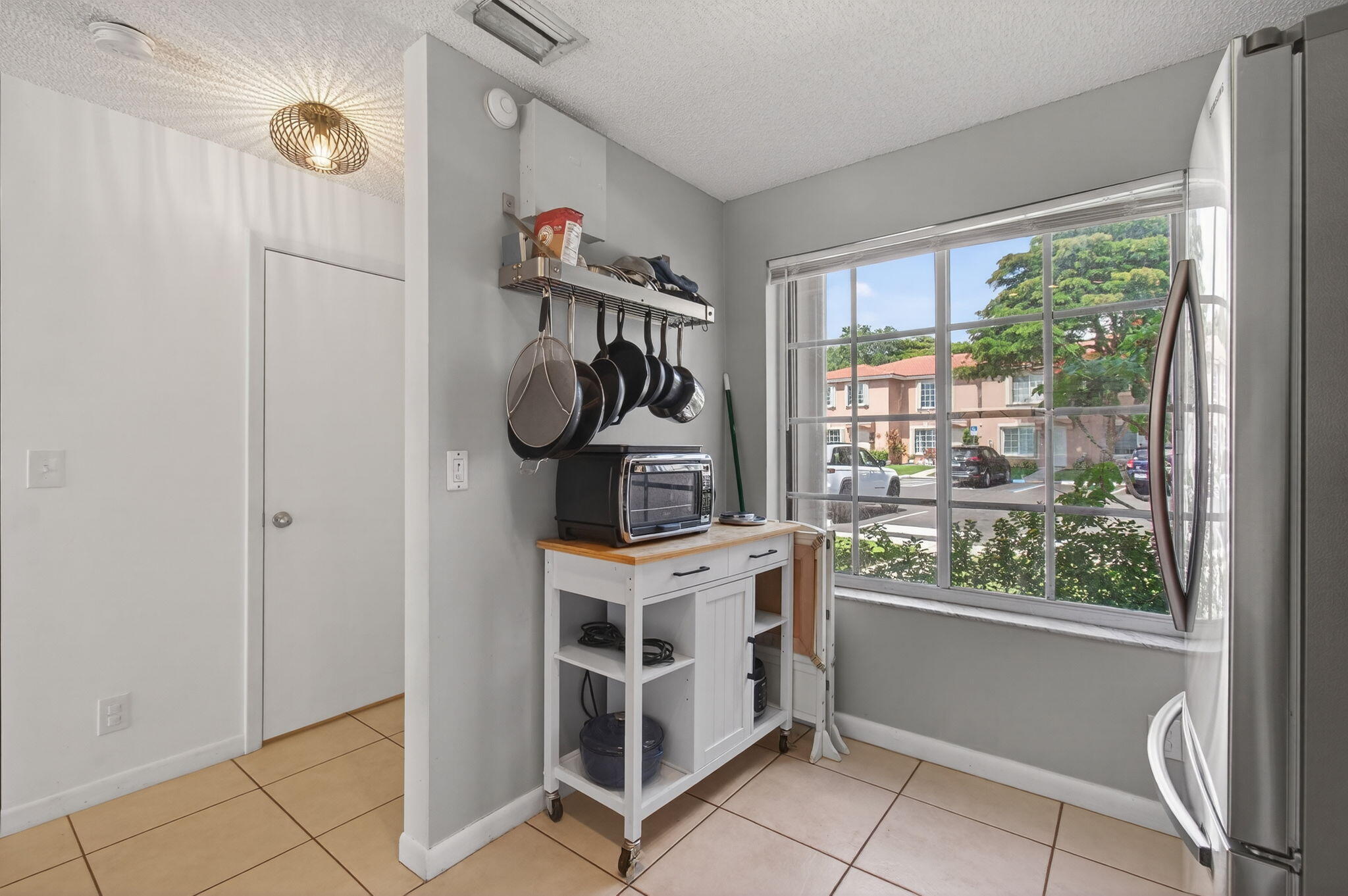 9931 Kamena Circle Boynton Beach, FL 33436 - Photo 11 of 37 a storage room with washer and dryer