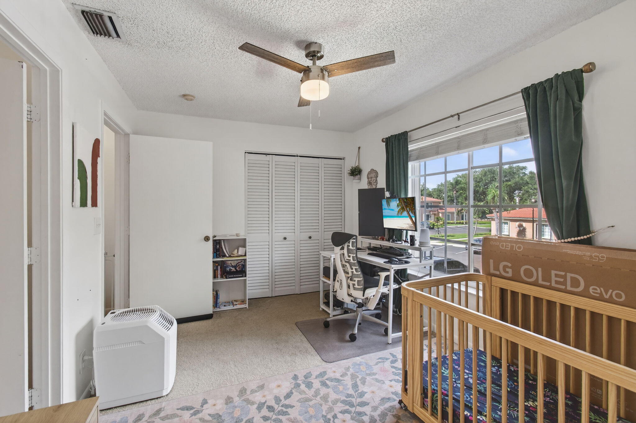 9931 Kamena Circle Boynton Beach, FL 33436 - Photo 24 of 37 a view of a livingroom with furniture and windows