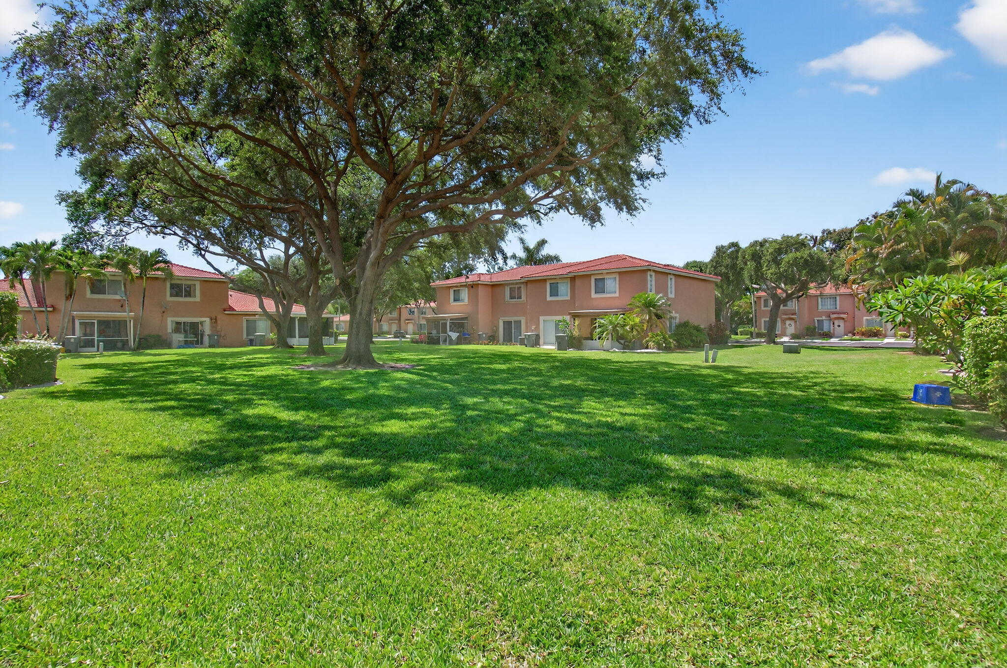 9931 Kamena Circle Boynton Beach, FL 33436 - Photo 32 of 37 a house with garden in front of it