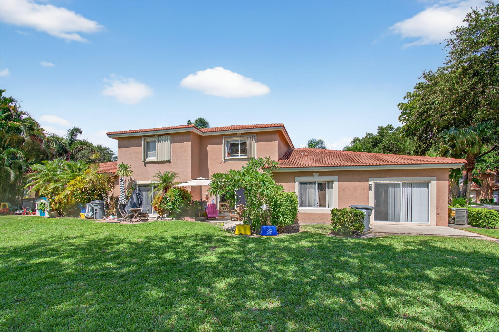 9931 Kamena Circle Boynton Beach, FL 33436 - Photo 33 of 37 a front view of house with yard and green space