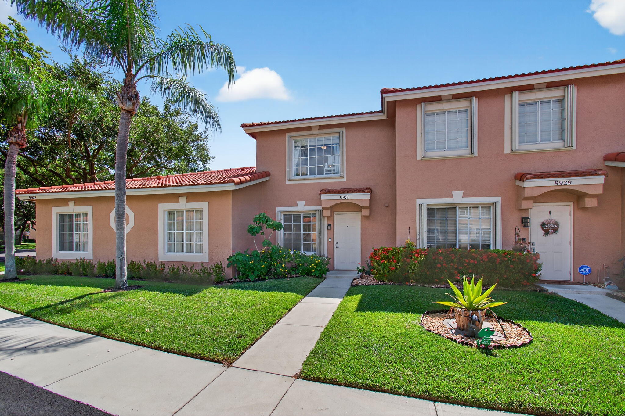 9931 Kamena Circle Boynton Beach, FL 33436 - Photo 37 of 37 a front view of house with yard and green space