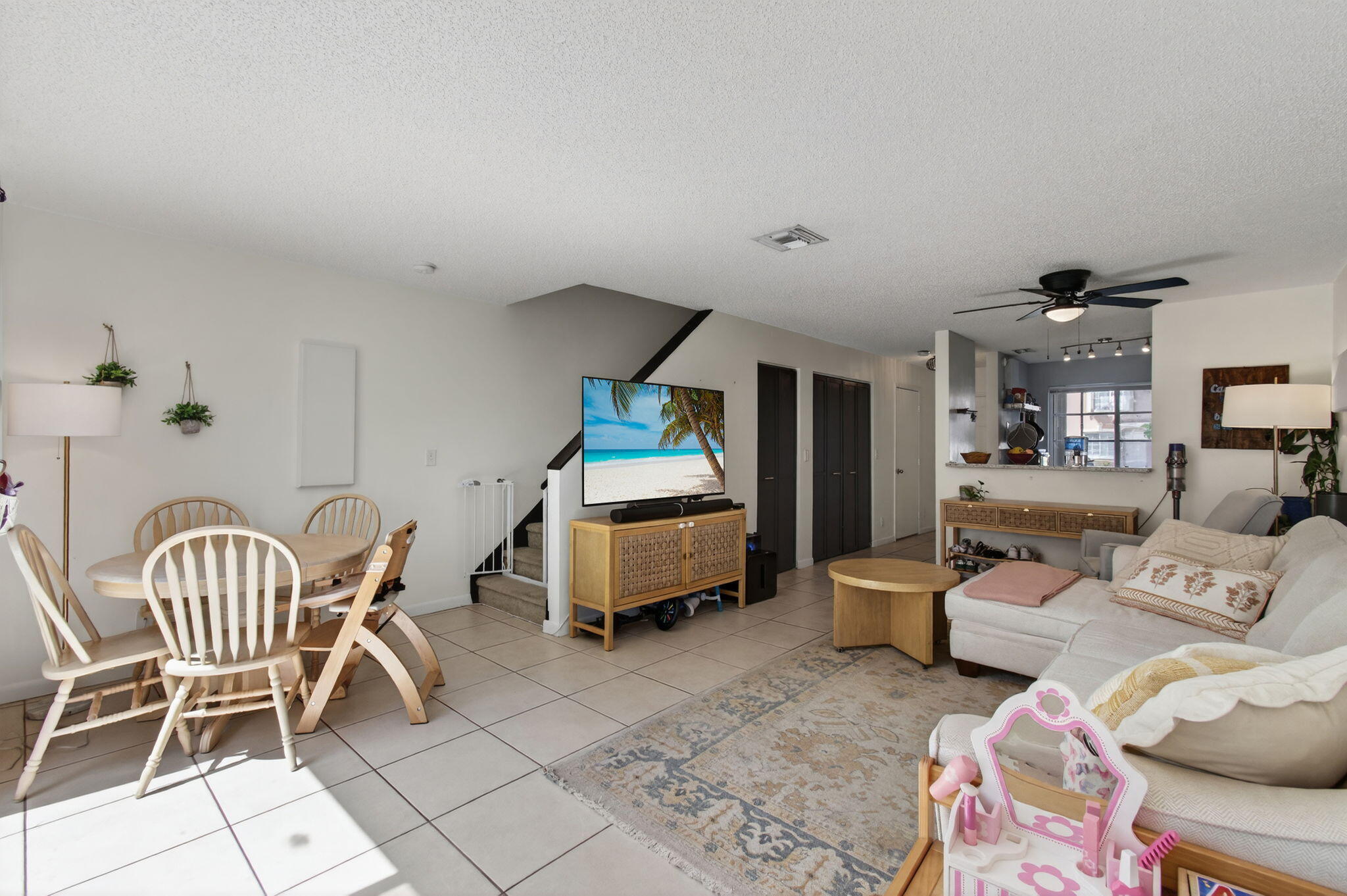 9931 Kamena Circle Boynton Beach, FL 33436 - Photo 6 of 37 a bedroom with furniture and a chair