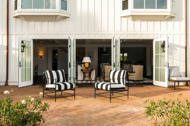 a outdoor living area with furniture and a potted plant