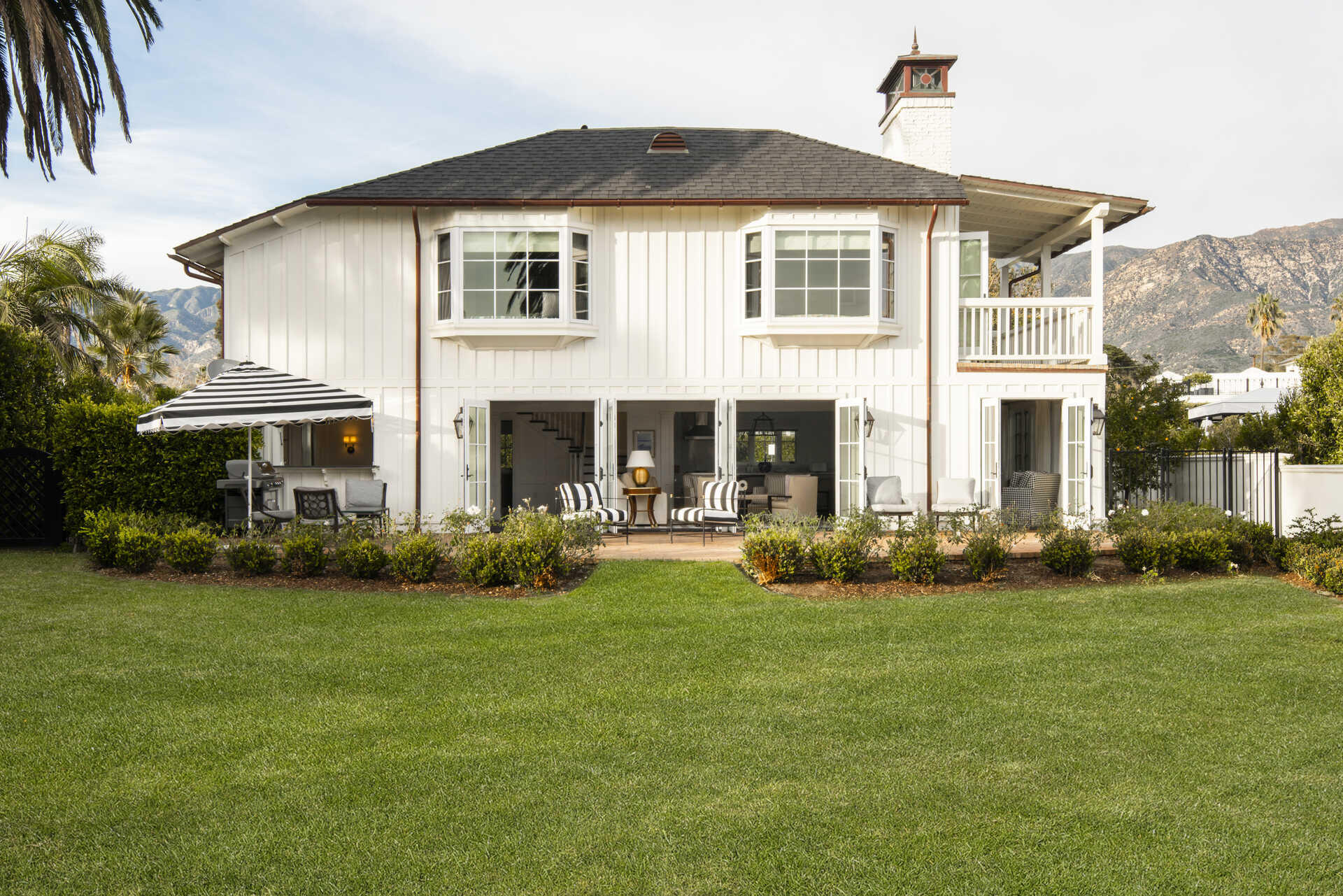 60 Miramar Avenue Montecito, CA 93108 - Photo 16 of 30 a front view of a house with a yard