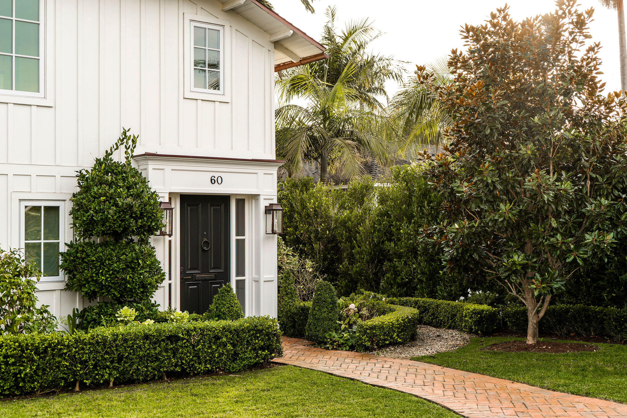 60 Miramar Avenue Montecito, CA 93108 - Photo 2 of 30 a front view of a house with garden