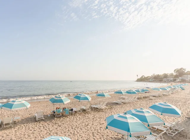 an aerial view of beach and ocean