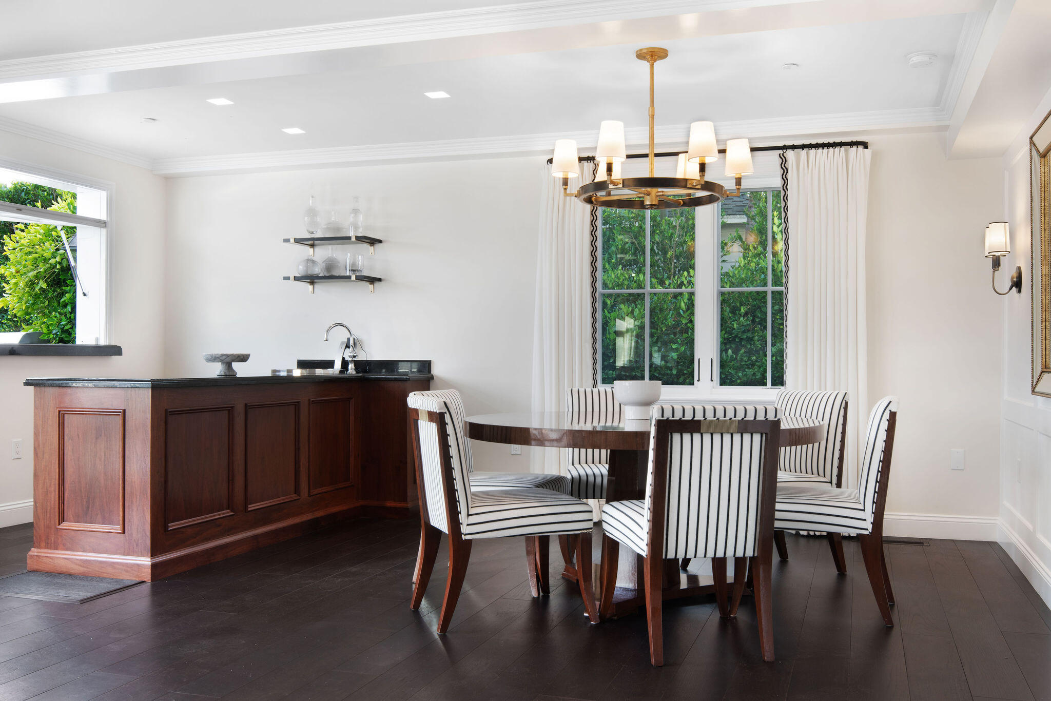 60 Miramar Avenue Montecito, CA 93108 - Photo 9 of 30 a dining room with furniture a chandelier and wooden floor
