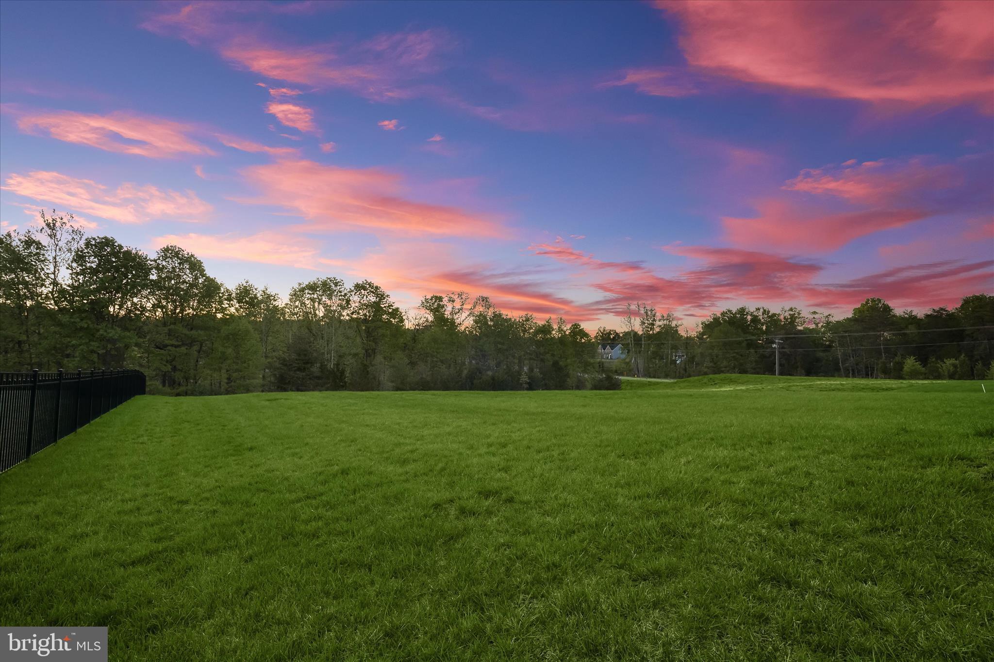 7306 Sugar Magnolia Loop Gainesville, VA 20155 - Photo 2 of 71 a view of an outdoor space and a yard