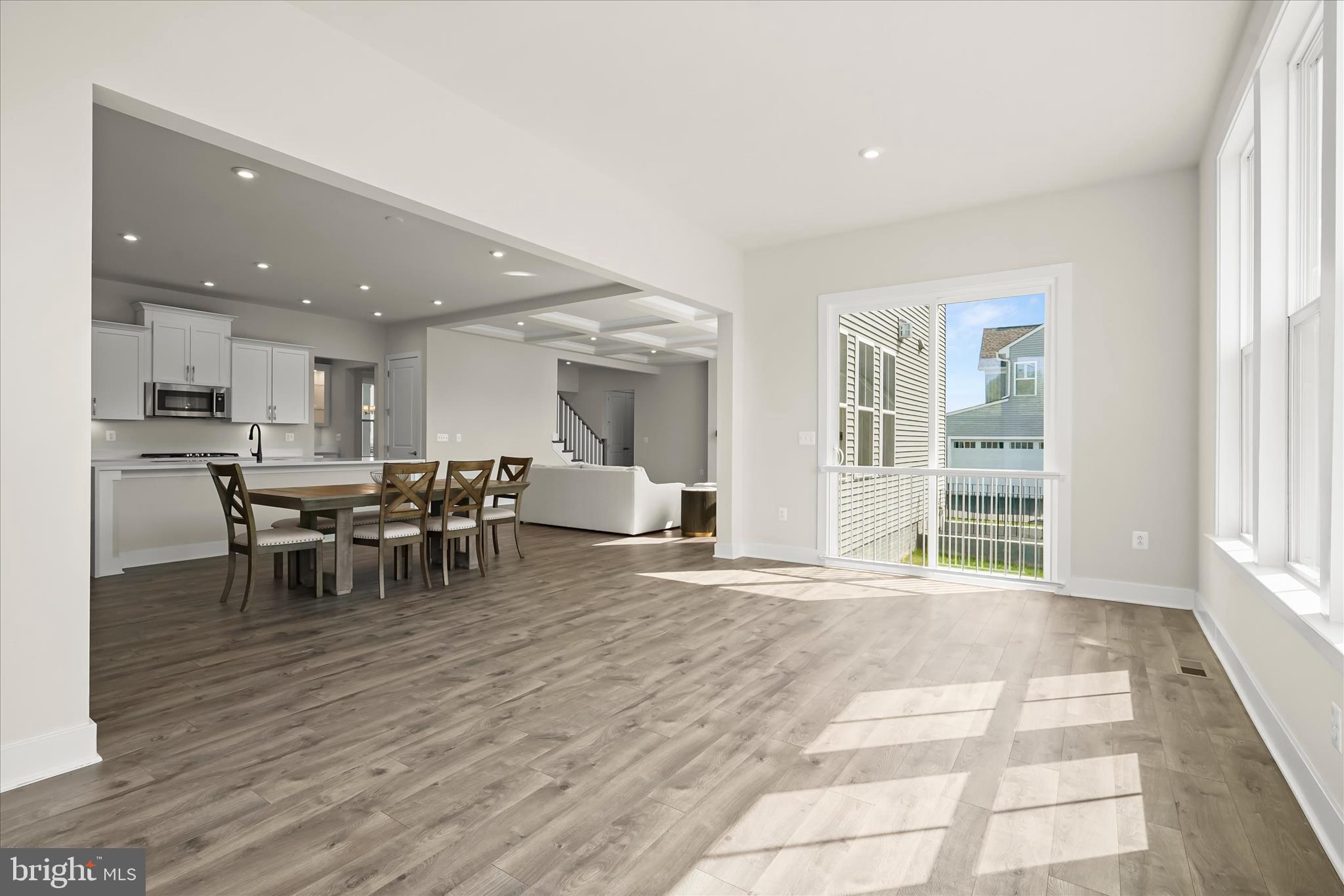 7306 Sugar Magnolia Loop Gainesville, VA 20155 - Photo 71 of 71 a view of a dining room with furniture and window