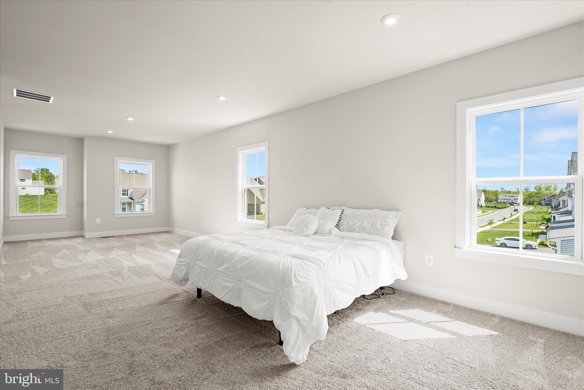 7306 Sugar Magnolia Loop Gainesville, VA 20155 - Photo 35 of 71 a bedroom with a bed and a window