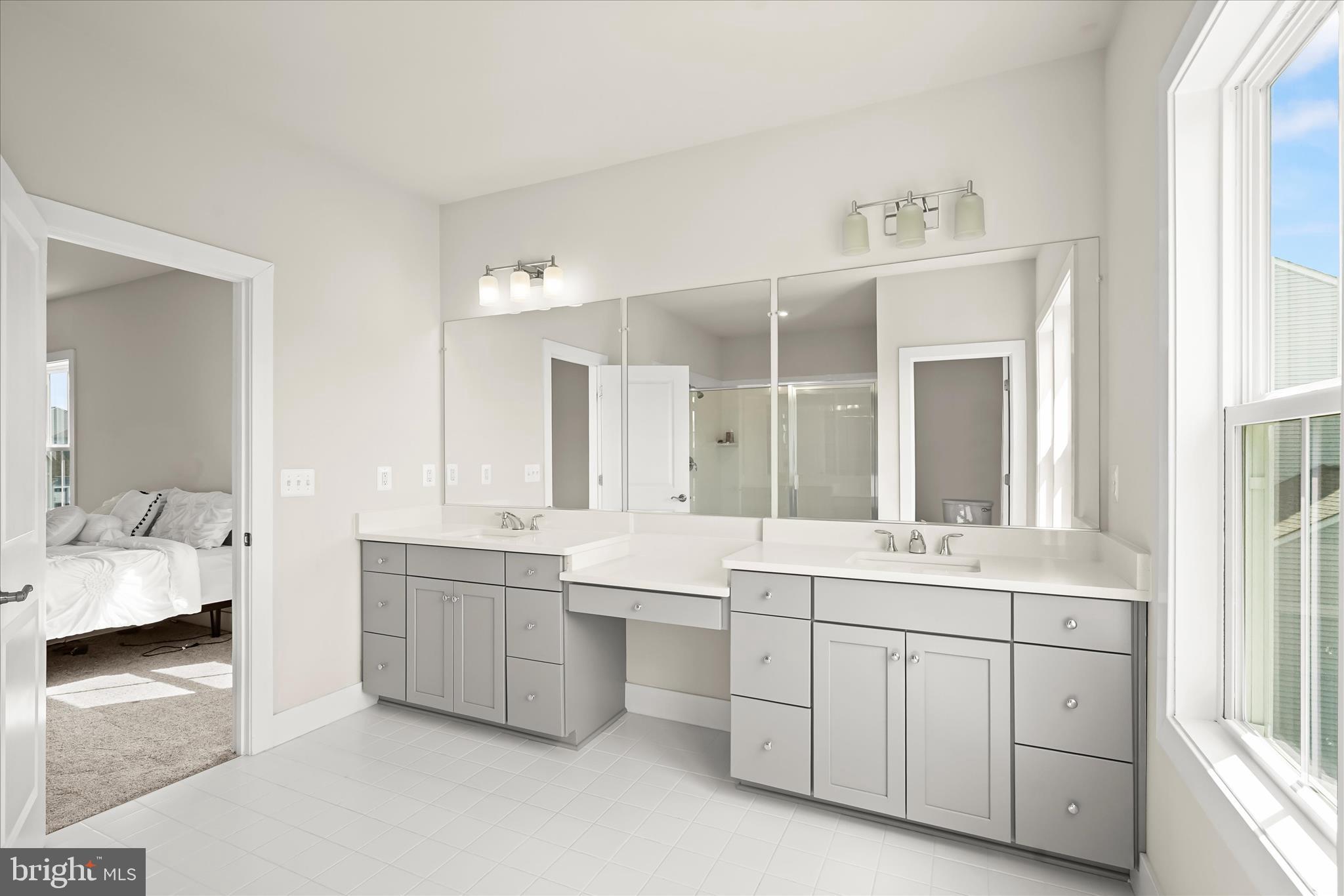 7306 Sugar Magnolia Loop Gainesville, VA 20155 - Photo 38 of 71 Luxury primary bedroom suite
