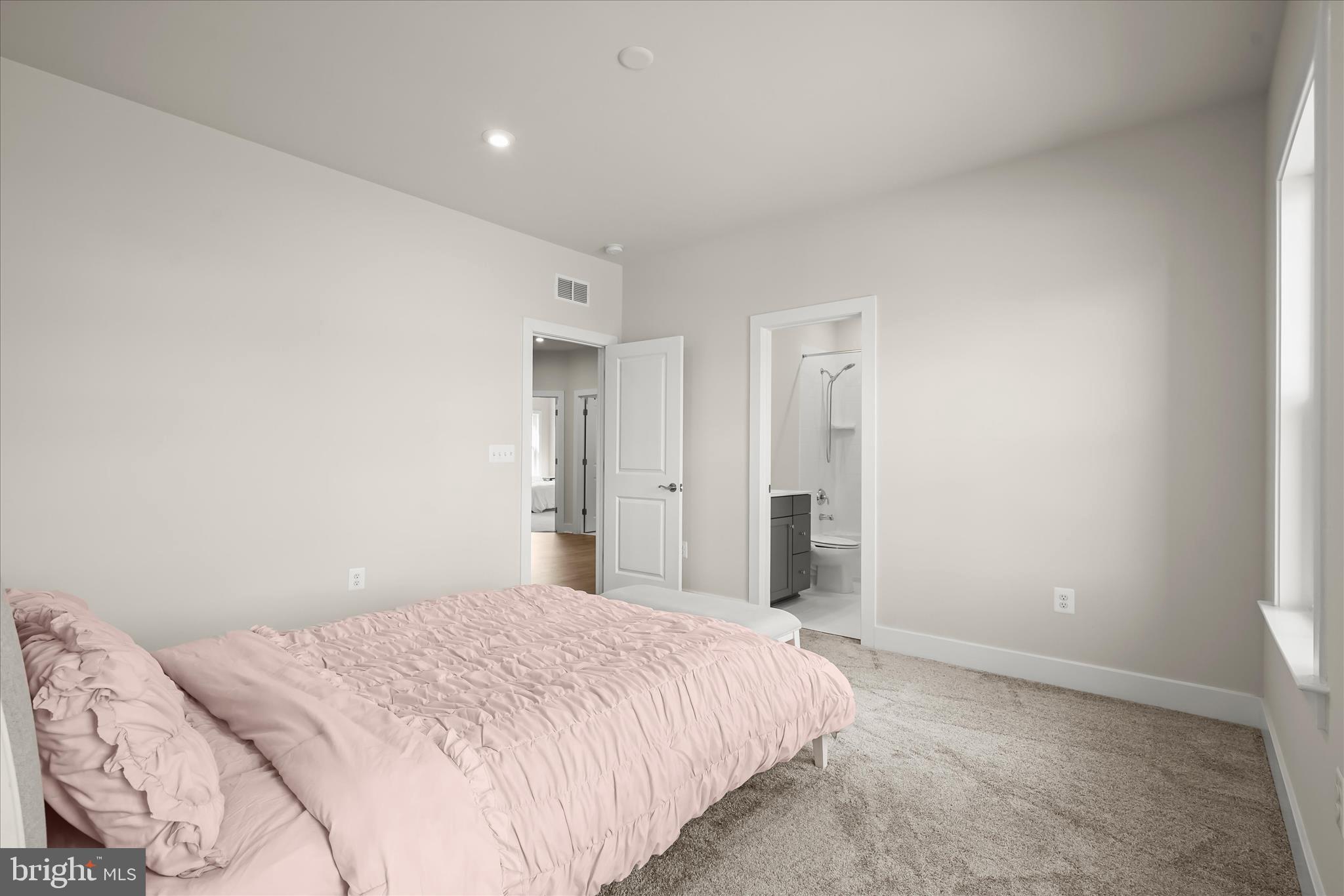 7306 Sugar Magnolia Loop Gainesville, VA 20155 - Photo 43 of 71 a bedroom with a bed and a window