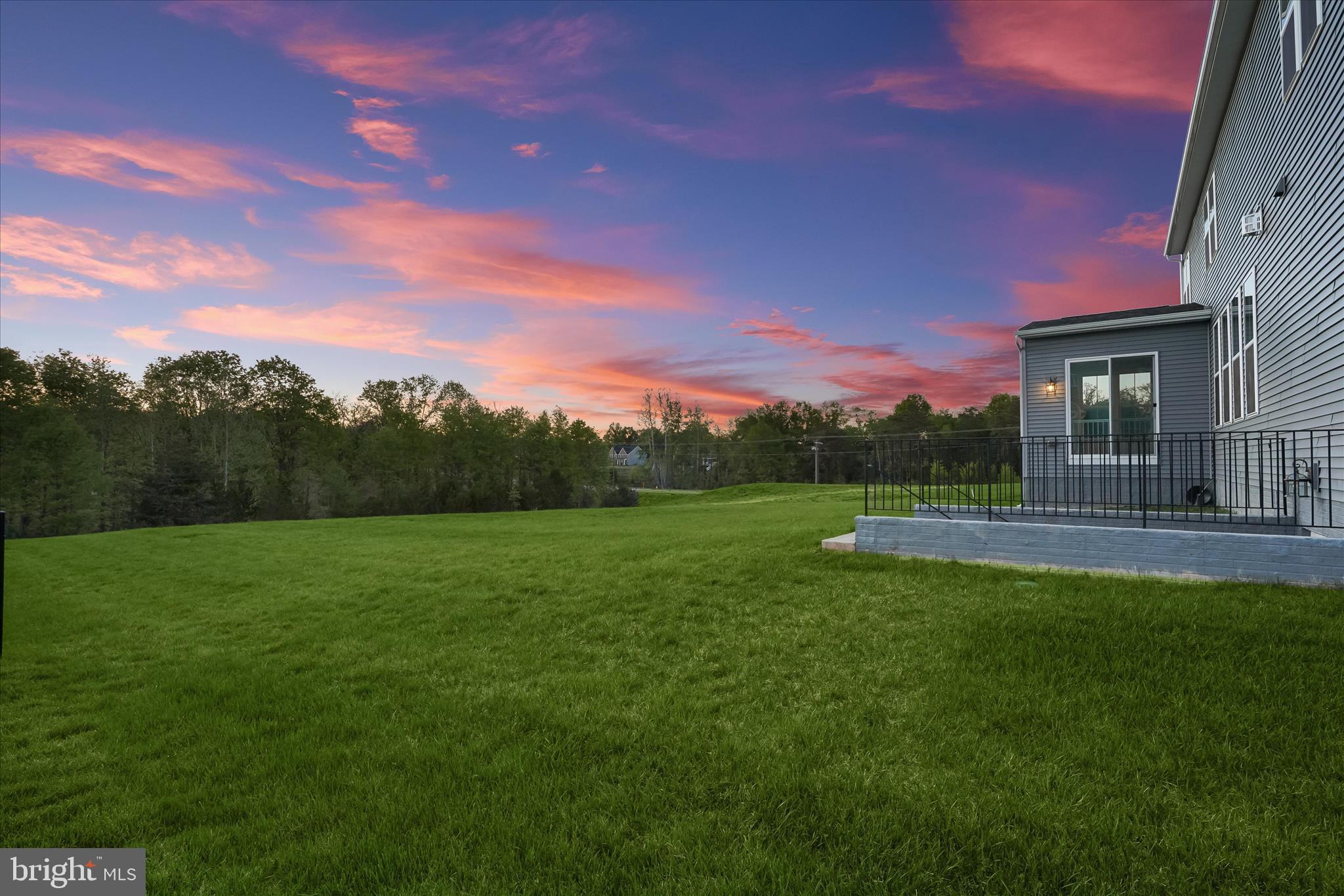7306 Sugar Magnolia Loop Gainesville, VA 20155 - Photo 58 of 71 Gorgeous sunset view from backyard