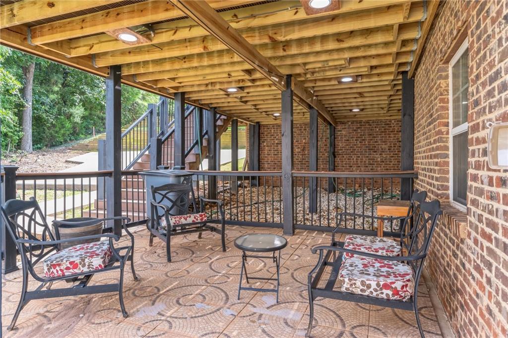 4152 Yearling Way Lithonia, GA 30038 - Photo 13 of 13 a view of a chairs and table in the patio