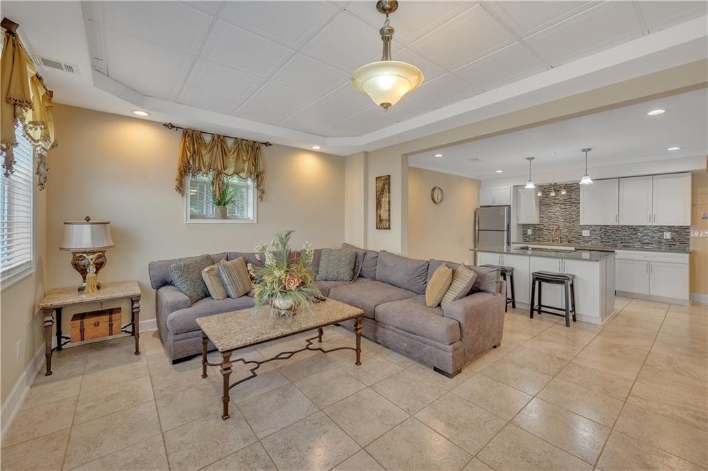 4152 Yearling Way Lithonia, GA 30038 - Photo 3 of 13 a living room with furniture and kitchen view
