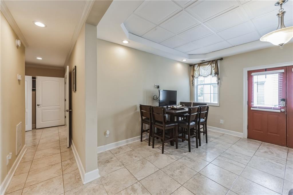 4152 Yearling Way Lithonia, GA 30038 - Photo 5 of 13 a view of a dining room with furniture and window