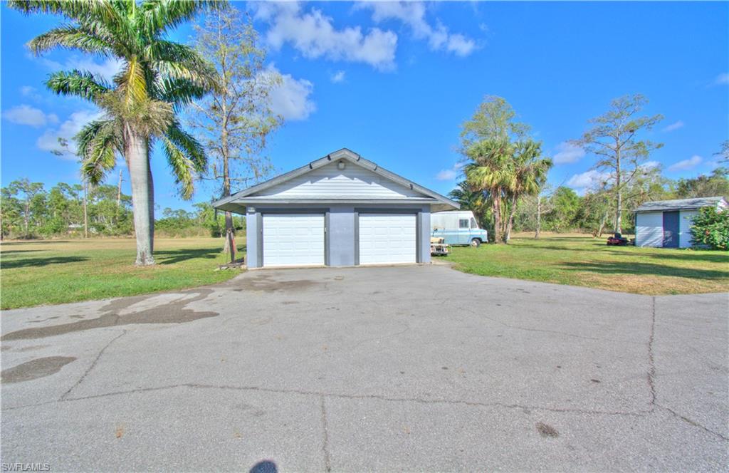 2600 Garland Road Naples, FL 34117 - Photo 2 of 34 a house with outdoor space