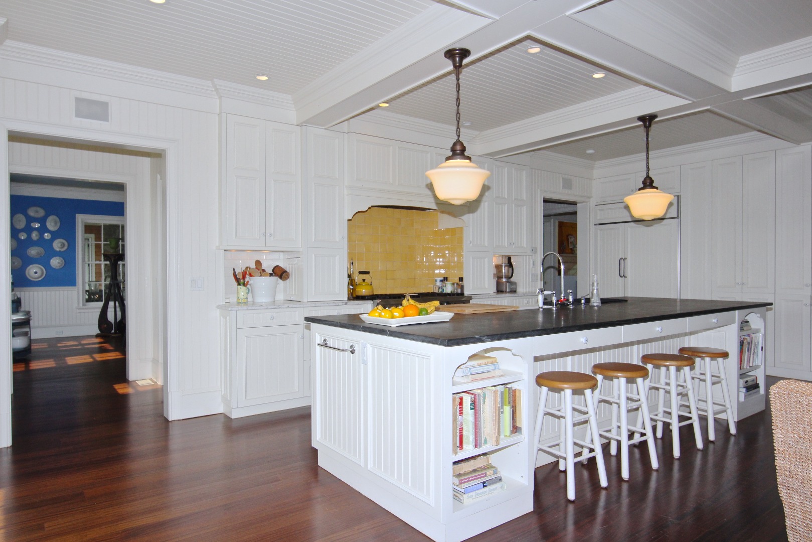 22 Lelands Path Edgartown, MA 02539 - Photo 11 of 87 a view of a kitchen with a sink and a chandelier