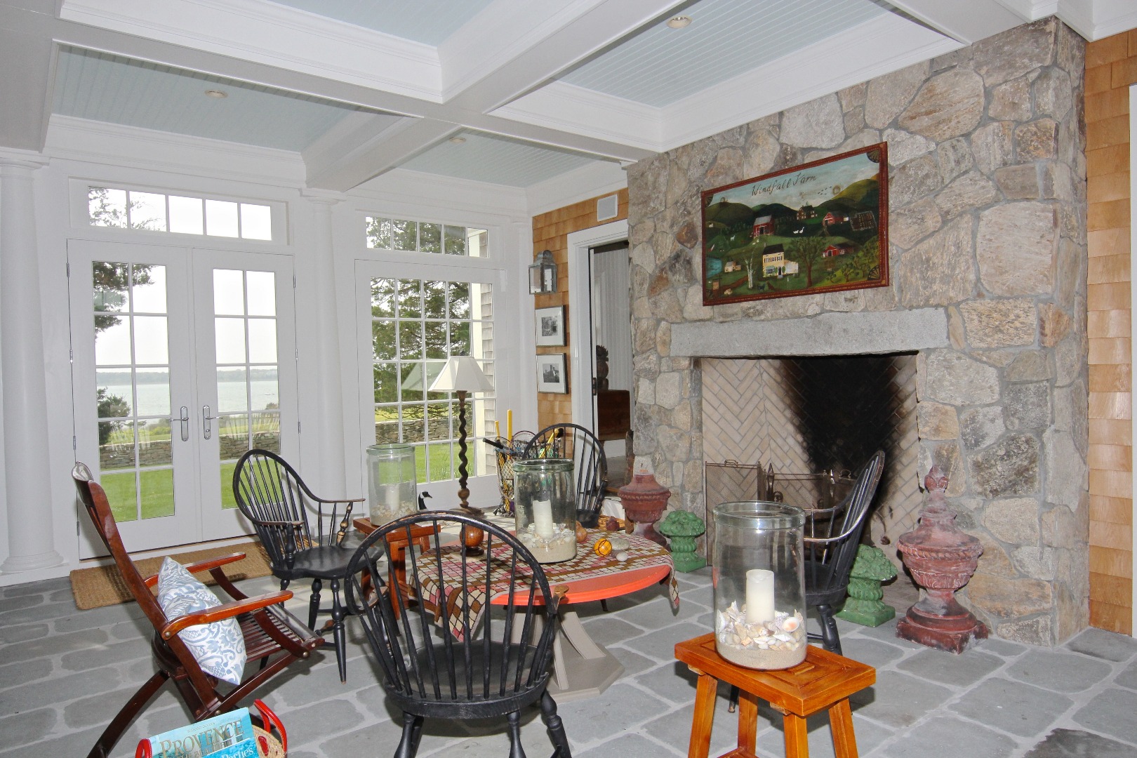22 Lelands Path Edgartown, MA 02539 - Photo 21 of 87 a living room with furniture a flat screen tv and a fireplace